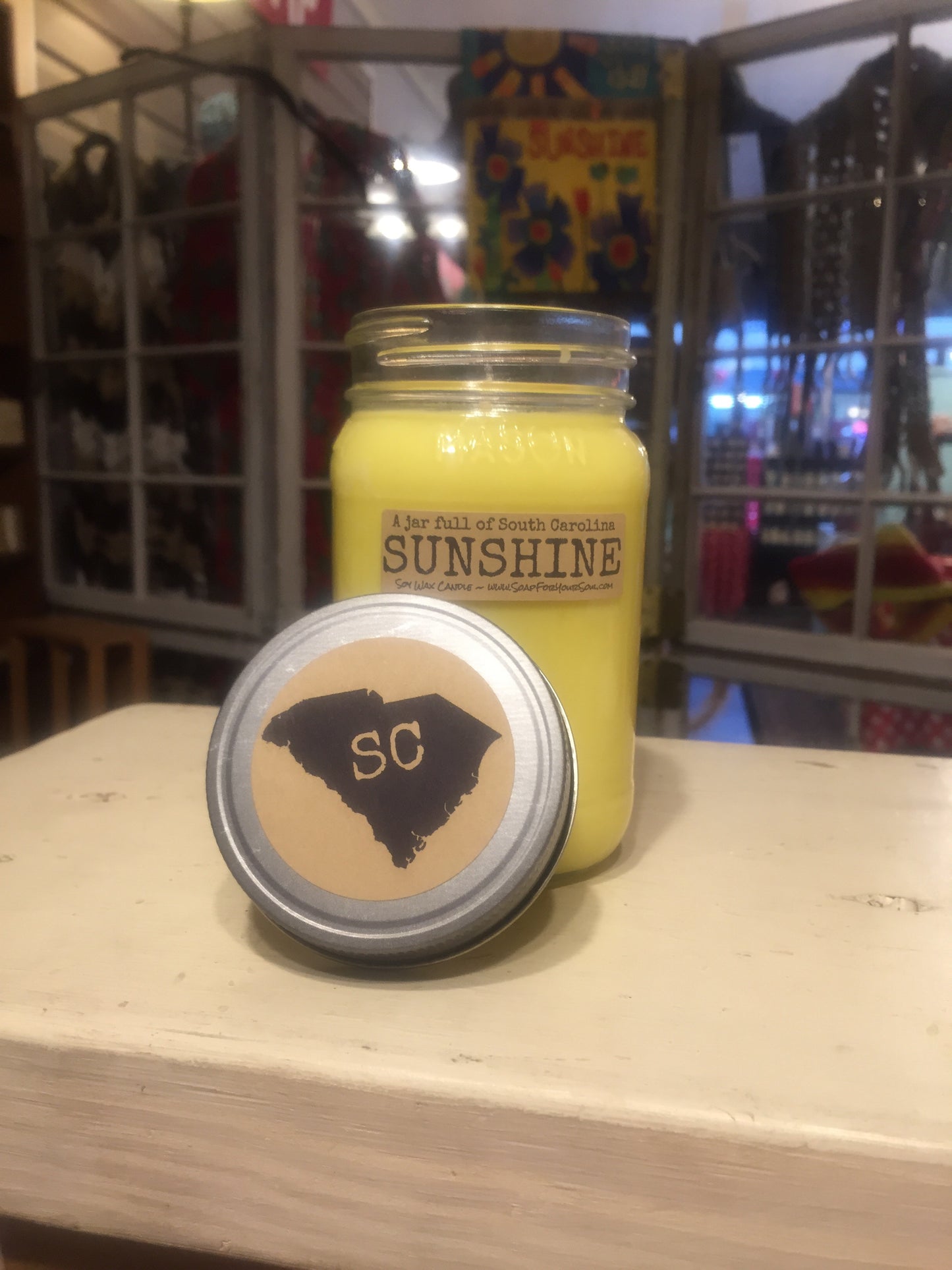 Jar full of South Carolina SUNSHINE soy candle